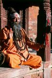 They are known, variously, as sadhus (saints, or 'good ones'), yogis (ascetic practitioners), fakirs (ascetic seeker after the Truth) and sannyasins (wandering mendicants and ascetics). They are the ascetic – and often eccentric – practitioners of an austere form of Hinduism. Sworn to cast off earthly desires, some choose to live as anchorites in the wilderness. Others are of a less retiring disposition, especially in the towns and temples of Nepal's Kathmandu Valley.<br/><br/>If the Vale of Kathmandu seems to boast more than its share of sadhus and yogis, this is because of the number and importance of Hindu temples in the region. The most important temple of Vishnu in the valley is Changunarayan, and here the visitor will find many Vaishnavite ascetics. Likewise, the most important temple for followers of Shiva is the temple at Pashupatinath.<br/><br/>Vishnu, also known as Narayan, can be identified by his four arms holding a sanka (sea shell), a chakra (round weapon), a gada (stick-like weapon) and a padma (lotus flower). The best-known incarnation of Vishnu is Krishna, and his animal is the mythical Garuda.<br/><br/>Shiva is often represented by the lingam, or phallus, as a symbol of his creative side. His animal is the bull, Nandi, and his weapon is the trisul, or trident. According to Hindu mythology Shiva is supposed to live in the Himalayas and wears a garland of snakes. He is also said to smoke a lot of bhang, or hashish.